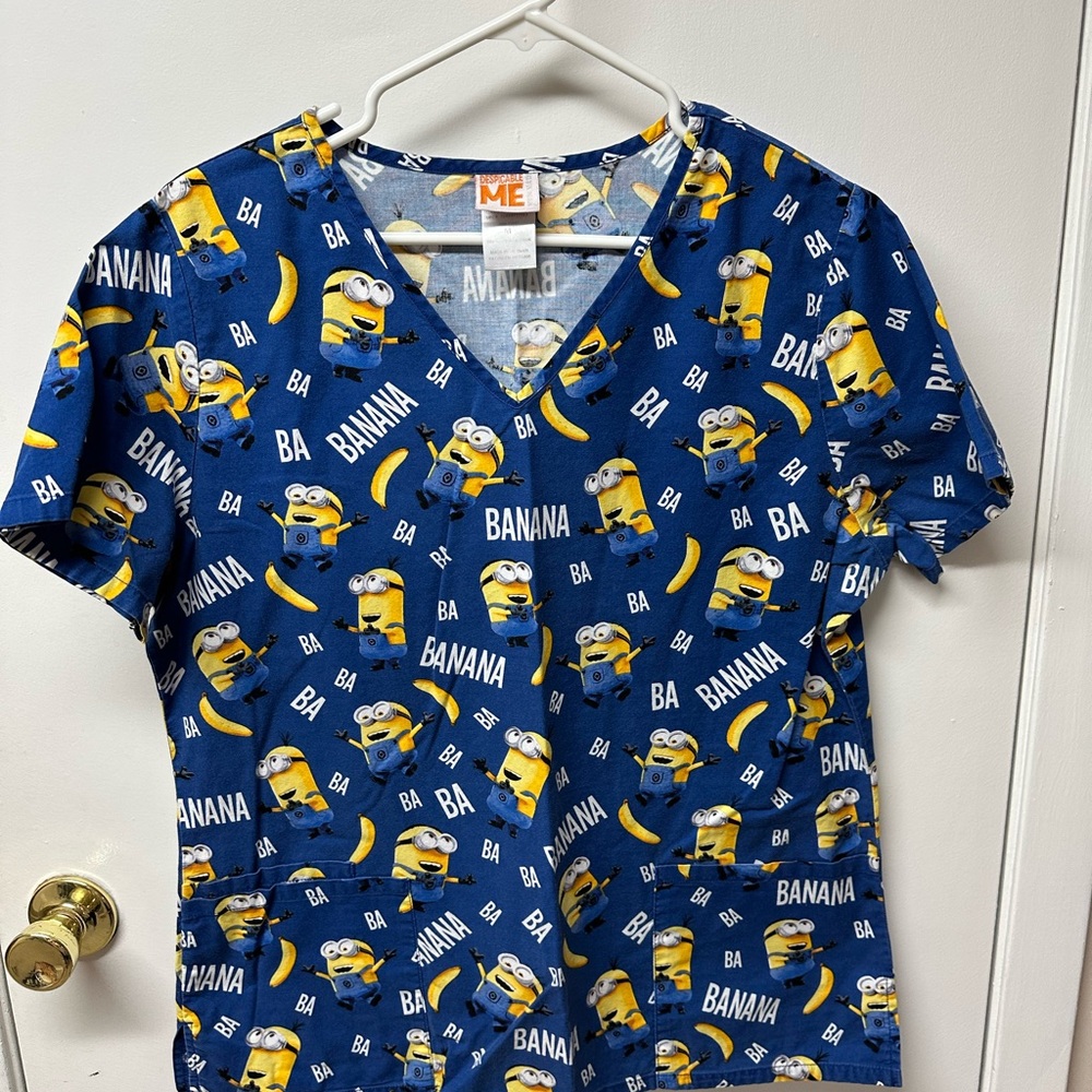 Women’s scrub top, excellent condition.